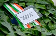 20 September 2022; A detailed view of the wreath placed on the grave of Michael Cusack at Glasnevin cemetery in Dublin by Uachtarán Chumann Lúthchleas Gael Larry McCarthy in a ceremony marking the 175th anniversary of the birth of the Clare school teacher who played a pivotal role in the formation of the GAA in 1884. Photo by Brendan Moran/Sportsfile