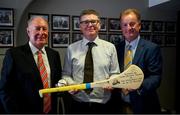 20 September 2022; Michael Cusack centre manager Tim Madden, right, and Sean O Laoire, make a presentation to Ard Stiúrthóir of the GAA Tom Ryan after a ceremony marking the 175th anniversary of the birth of Michael Cusack, the Clare school teacher who played a pivotal role in the formation of the GAA in 1884. Photo by Brendan Moran/Sportsfile