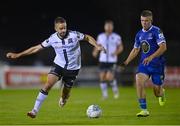 16 September 2022; Robbie Benson of Dundalk and Niall O'Keeffe of Waterford during the Extra.ie FAI Cup Quarter-Final match between Waterford and Dundalk at the RSC in Waterford. Photo by Ben McShane/Sportsfile