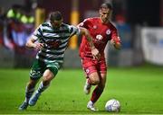 22 September 2022; John Ross Wilson of Shelbourne in action against Neil Farrugia of Shamrock Rovers during the SSE Airtricity League Premier Division match between Shelbourne and Shamrock Rovers at Tolka Park in Dublin. Photo by Sam Barnes/Sportsfile