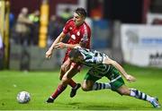 22 September 2022; Sean Boyd of Shelbourne is fouled by Neil Farrugia of Shamrock Rovers during the SSE Airtricity League Premier Division match between Shelbourne and Shamrock Rovers at Tolka Park in Dublin. Photo by Sam Barnes/Sportsfile