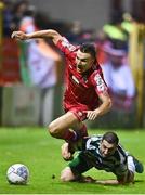 22 September 2022; Sean Boyd of Shelbourne is fouled by Neil Farrugia of Shamrock Rovers during the SSE Airtricity League Premier Division match between Shelbourne and Shamrock Rovers at Tolka Park in Dublin. Photo by Sam Barnes/Sportsfile