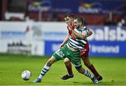 22 September 2022; Neil Farrugia of Shamrock Rovers in action against Sean Boyd of Shelbourne  during the SSE Airtricity League Premier Division match between Shelbourne and Shamrock Rovers at Tolka Park in Dublin. Photo by Sam Barnes/Sportsfile