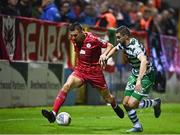 22 September 2022; Sean Boyd of Shelbourne in action against Neil Farrugia of Shamrock Rovers during the SSE Airtricity League Premier Division match between Shelbourne and Shamrock Rovers at Tolka Park in Dublin. Photo by Sam Barnes/Sportsfile