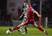 22 September 2022; Dan Cleary of Shamrock Rovers in action against Gavin Molloy of Shelbourne during the SSE Airtricity League Premier Division match between Shelbourne and Shamrock Rovers at Tolka Park in Dublin. Photo by Sam Barnes/Sportsfile