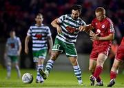 22 September 2022; Richie Towell of Shamrock Rovers in action against Gavin Molloy of Shelbourne during the SSE Airtricity League Premier Division match between Shelbourne and Shamrock Rovers at Tolka Park in Dublin. Photo by Sam Barnes/Sportsfile