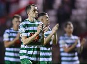 22 September 2022; Shamrock Rovers players, including Sean Kavanagh, second from left, applaud their supporters after the SSE Airtricity League Premier Division match between Shelbourne and Shamrock Rovers at Tolka Park in Dublin. Photo by Sam Barnes/Sportsfile