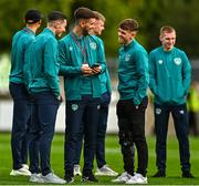 23 September 2022; Brian Maher of Republic of Ireland shares a joke with teammates, Conor Coventry, left, and Gavin Kilkenny before the UEFA European U21 Championship play-off first leg match between Republic of Ireland and Israel at Tallaght Stadium in Dublin. Photo by Eóin Noonan/Sportsfile