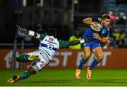 23 September 2022; Jordan Larmour of Leinster is tackled by Onisi Ratave of Benetton during the United Rugby Championship match between Leinster and Benetton at the RDS Arena in Dublin. Photo by Harry Murphy/Sportsfile