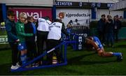 23 September 2022; Michael Ala'alatoa of Leinster warms up with the assistance of children before the United Rugby Championship match between Leinster and Benetton at the RDS Arena in Dublin. Photo by Harry Murphy/Sportsfile