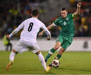 23 September 2022; Conor Coventry of Republic of Ireland in action against Mohammad Kanaan of Israel during the UEFA European U21 Championship play-off first leg match between Republic of Ireland and Israel at Tallaght Stadium in Dublin. Photo by Seb Daly/Sportsfile