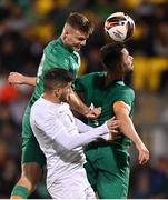23 September 2022; Evan Ferguson of Republic of Ireland, left, heads his side's first goal during the UEFA European U21 Championship play-off first leg match between Republic of Ireland and Israel at Tallaght Stadium in Dublin. Photo by Seb Daly/Sportsfile