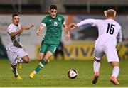 23 September 2022; Dawson Devoy of Republic of Ireland in action against Oscar Gloukh, left, and Yoav Hofmeister of Israel during the UEFA European U21 Championship play-off first leg match between Republic of Ireland and Israel at Tallaght Stadium in Dublin. Photo by Seb Daly/Sportsfile