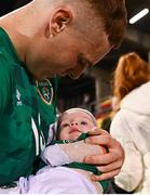 23 September 2022; Jake O'Brien of Republic of Ireland with his nephew, 3 month old Beau Summerton, after during the UEFA European U21 Championship play-off first leg match between Republic of Ireland and Israel at Tallaght Stadium in Dublin. Photo by Eóin Noonan/Sportsfile