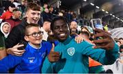 23 September 2022; Festy Ebosele of Republic of Ireland with supporters after the UEFA European U21 Championship play-off first leg match between Republic of Ireland and Israel at Tallaght Stadium in Dublin. Photo by Seb Daly/Sportsfile