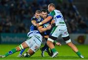 23 September 2022; Cian Healy of Leinster, supported by teammate Ross Molony, is tackled by Niccolò Cannone and Carl Wegner of Benetton during the United Rugby Championship match between Leinster and Benetton at the RDS Arena in Dublin. Photo by Brendan Moran/Sportsfile