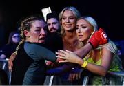 23 September 2022; Leah McCourt celebrates with supporters after defeating Dayana Silva during their women's featherweight bout during Bellator 285 at 3 Arena in Dublin. Photo by Sam Barnes/Sportsfile