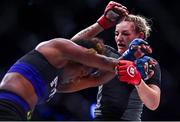 23 September 2022; Leah McCourt, right, in action against Dayana Silva during their women's featherweight bout during Bellator 285 at 3 Arena in Dublin. Photo by Sam Barnes/Sportsfile