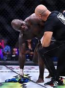 23 September 2022; Melvin Manhoef is consoled by a member of his corner after announcing his retirement following his light heavyweight bout loss to Yoel Romero during Bellator 285 at 3 Arena in Dublin. Photo by Sam Barnes/Sportsfile