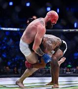 23 September 2022; Peter Queally, top, in action against Benson Henderson during their lightweight bout during Bellator 285 at 3 Arena in Dublin. Photo by Sam Barnes/Sportsfile