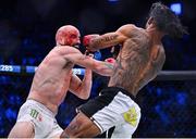 23 September 2022; Peter Queally, left, in action against Benson Henderson during their lightweight bout during Bellator 285 at 3 Arena in Dublin. Photo by Sam Barnes/Sportsfile