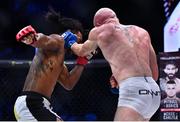 23 September 2022; Peter Queally, right, in action against Benson Henderson during their lightweight bout during Bellator 285 at 3 Arena in Dublin. Photo by Sam Barnes/Sportsfile
