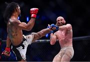 23 September 2022;  Peter Queally, right, in action against Benson Henderson during their lightweight bout during Bellator 285 at 3 Arena in Dublin. Photo by Sam Barnes/Sportsfile