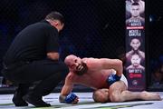 23 September 2022; Peter Queally after being caught low by Benson Henderson during their lightweight bout during Bellator 285 at 3 Arena in Dublin. Photo by Sam Barnes/Sportsfile