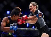 23 September 2022; Leah McCourt, right, in action against Dayana Silva during their women's featherweight bout during Bellator 285 at 3 Arena in Dublin. Photo by Sam Barnes/Sportsfile