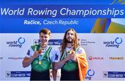 24 September 2022; Fintan McCarthy, left, and Paul O'Donovan of Ireland sing Amhrán na bhFiann after winning the Lightweight Men's Double Sculls Final A, in a time of 06:16.46, during day 7 of the World Rowing Championships 2022 at Racice in Czech Republic. Photo by Piaras Ó Mídheach/Sportsfile