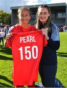 24 September 2022; Pearl Slattery of Shelbourne, left, is presented with a jersey celebrating her 150th appearance by teammate Rachel Graham after the EVOKE.ie FAI Women's Cup Semi-Final match between Shelbourne and Bohemians at Tolka Park in Dublin. Photo by Seb Daly/Sportsfile