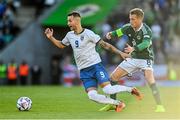 24 September 2022; Bersant Celina of Kosovo in action against Steven Davis of Northern Ireland during the UEFA Nations League C Group 2 match between Northern Ireland and Kosovo at National Stadium at Windsor Park in Belfast. Photo by Ramsey Cardy/Sportsfile