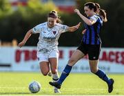 24 September 2022; Becky Watkins of Wexford Youths in action against Kayleigh Shine of Athlone Town during a 2022 EVOKE.ie FAI Women's Cup Semi-Finals match between Athlone Town and Wexford Youths at Athlone Town Stadium in Westmeath. Photo by Michael P Ryan/Sportsfile