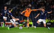 24 September 2022; Troy Parrott of Republic of Ireland in action against Jack Hendry, right, and Kieran Tierney of Scotland during UEFA Nations League B Group 1 match between Scotland and Republic of Ireland at Hampden Park in Glasgow, Scotland. Photo by Eóin Noonan/Sportsfile