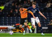 24 September 2022; Troy Parrott of Republic of Ireland in action against Jack Hendry of Scotland during UEFA Nations League B Group 1 match between Scotland and Republic of Ireland at Hampden Park in Glasgow, Scotland. Photo by Eóin Noonan/Sportsfile
