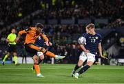 24 September 2022; Troy Parrott of Republic of Ireland has a shot on goal despite the attention of Jack Hendry of Scotland during UEFA Nations League B Group 1 match between Scotland and Republic of Ireland at Hampden Park in Glasgow, Scotland. Photo by Eóin Noonan/Sportsfile