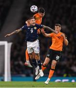 24 September 2022; Lyndon Dykes of Scotland in action against John Egan, centre, and Dara O'Shea of Republic of Ireland during UEFA Nations League B Group 1 match between Scotland and Republic of Ireland at Hampden Park in Glasgow, Scotland. Photo by Stephen McCarthy/Sportsfile