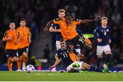 24 September 2022; Michael Obafemi of Republic of Ireland avoids the tackle of Ryan Christie of Scotland during UEFA Nations League B Group 1 match between Scotland and Republic of Ireland at Hampden Park in Glasgow, Scotland. Photo by Stephen McCarthy/Sportsfile