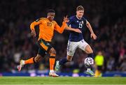 24 September 2022; Chiedozie Ogbene of Republic of Ireland in action against Jack Hendry of Scotland during UEFA Nations League B Group 1 match between Scotland and Republic of Ireland at Hampden Park in Glasgow, Scotland. Photo by Stephen McCarthy/Sportsfile