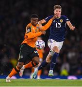 24 September 2022; Chiedozie Ogbene of Republic of Ireland in action against Jack Hendry of Scotland during UEFA Nations League B Group 1 match between Scotland and Republic of Ireland at Hampden Park in Glasgow, Scotland. Photo by Stephen McCarthy/Sportsfile