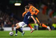 24 September 2022; Jack Hendry of Scotland in action against Chiedozie Ogbene of Republic of Ireland during UEFA Nations League B Group 1 match between Scotland and Republic of Ireland at Hampden Park in Glasgow, Scotland. Photo by Eóin Noonan/Sportsfile