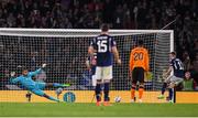 24 September 2022; Republic of Ireland goalkeeper Gavin Bazunu fails to stop the penalty of Ryan Christie, right, for Scotland's second goal during UEFA Nations League B Group 1 match between Scotland and Republic of Ireland at Hampden Park in Glasgow, Scotland. Photo by Stephen McCarthy/Sportsfile