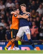 24 September 2022; Josh Cullen of Republic of Ireland and Jack Hendry of Scotland tussle during UEFA Nations League B Group 1 match between Scotland and Republic of Ireland at Hampden Park in Glasgow, Scotland. Photo by Stephen McCarthy/Sportsfile