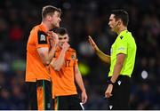 24 September 2022; Nathan Collins of Republic of Ireland protests to referee Sandro Schärer during UEFA Nations League B Group 1 match between Scotland and Republic of Ireland at Hampden Park in Glasgow, Scotland. Photo by Eóin Noonan/Sportsfile
