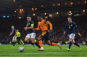 24 September 2022; Chiedozie Ogbene of Republic of Ireland and John McGinn of Scotland during UEFA Nations League B Group 1 match between Scotland and Republic of Ireland at Hampden Park in Glasgow, Scotland. Photo by Stephen McCarthy/Sportsfile