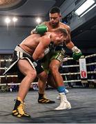 24 September 2022; Tommy McCarthy, right, and Reinis Porozovs during their cruiserweight bout at the Europa Hotel in Belfast. Photo by Ramsey Cardy/Sportsfile