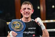 24 September 2022; Eric Donovan with the EBU European Union belt after defeating Khalil El Hadri in their EBU European Union super-featherweight bout at the Europa Hotel in Belfast. Photo by Ramsey Cardy/Sportsfile