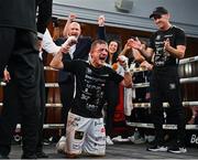 24 September 2022; Eric Donovan celebrates defeating Khalil El Hadri in their EBU European Union super-featherweight bout at the Europa Hotel in Belfast. Photo by Ramsey Cardy/Sportsfile
