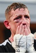 24 September 2022; Eric Donovan awaits the decision of his EBU European Union super-featherweight bout against Khalil El Hadri at the Europa Hotel in Belfast. Photo by Ramsey Cardy/Sportsfile