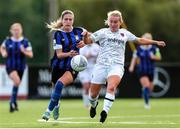 24 September 2022; Nicola Sinnott of Wexford Youths in action against Maddie Gibson of Athlone Town during a 2022 EVOKE.ie FAI Women's Cup Semi-Finals match between Athlone Town and Wexford Youths at Athlone Town Stadium in Westmeath. Photo by Michael P Ryan/Sportsfile